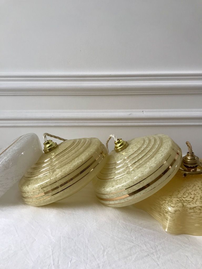 Pair of suspensions in yellow Clichy glass and golden border 40s-50s
