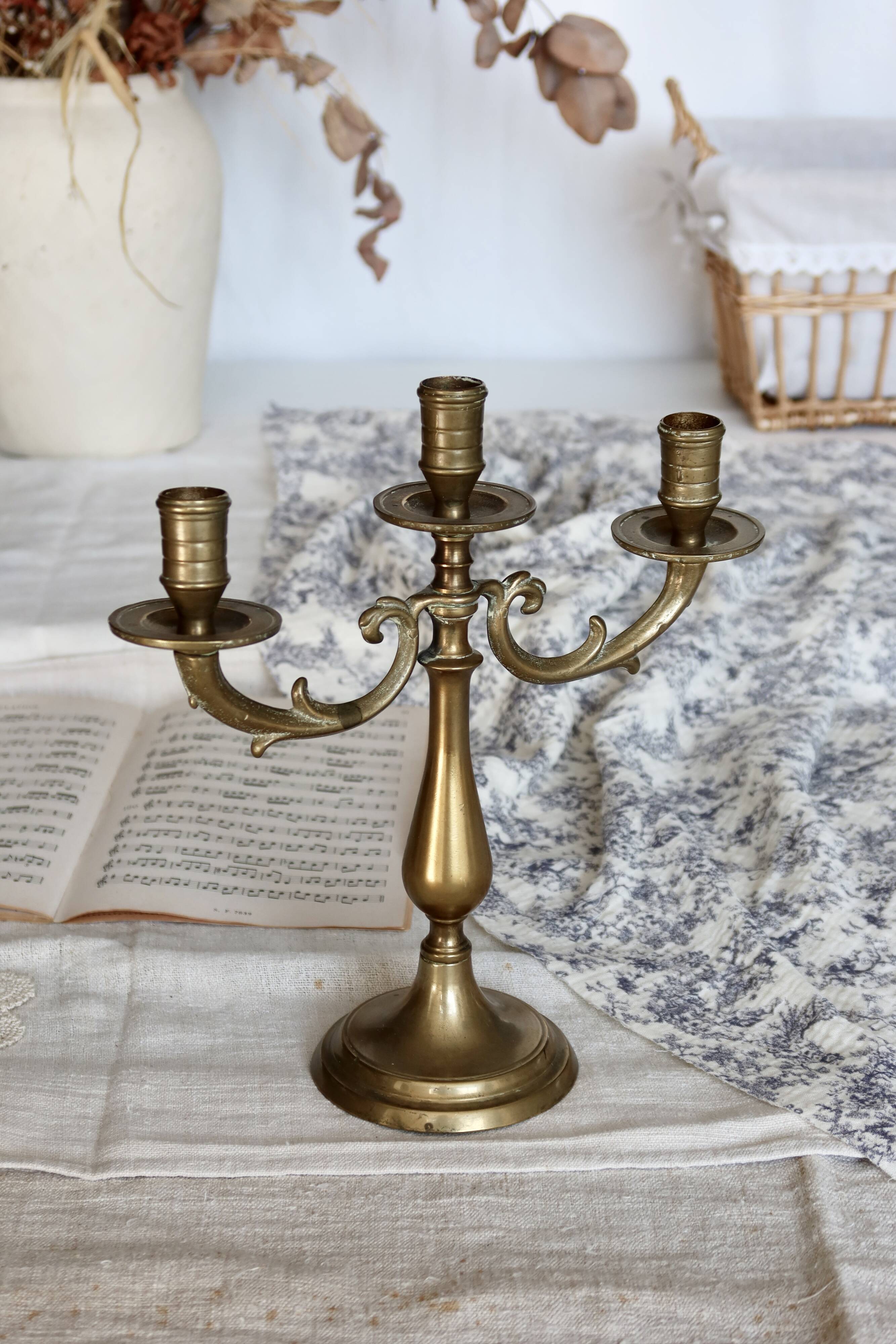 Antique 3-branch candelabra in patinated brass