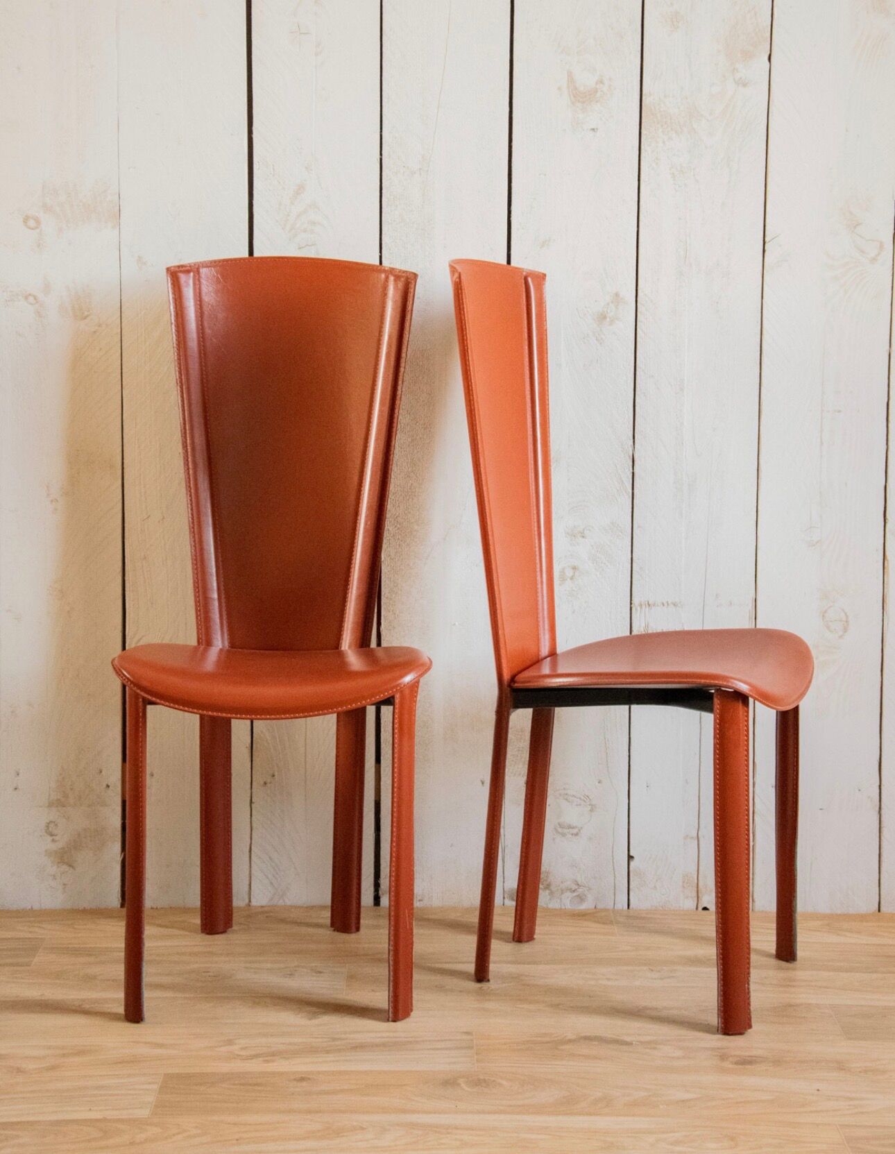 Set of 6 leather chairs by Roche Bobois.
