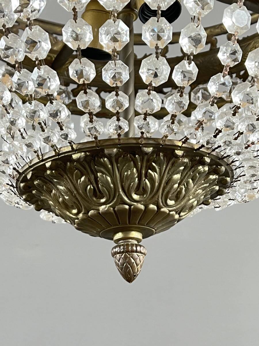 Empire-style chandelier in bronze with crystal pendants, early 20th century.