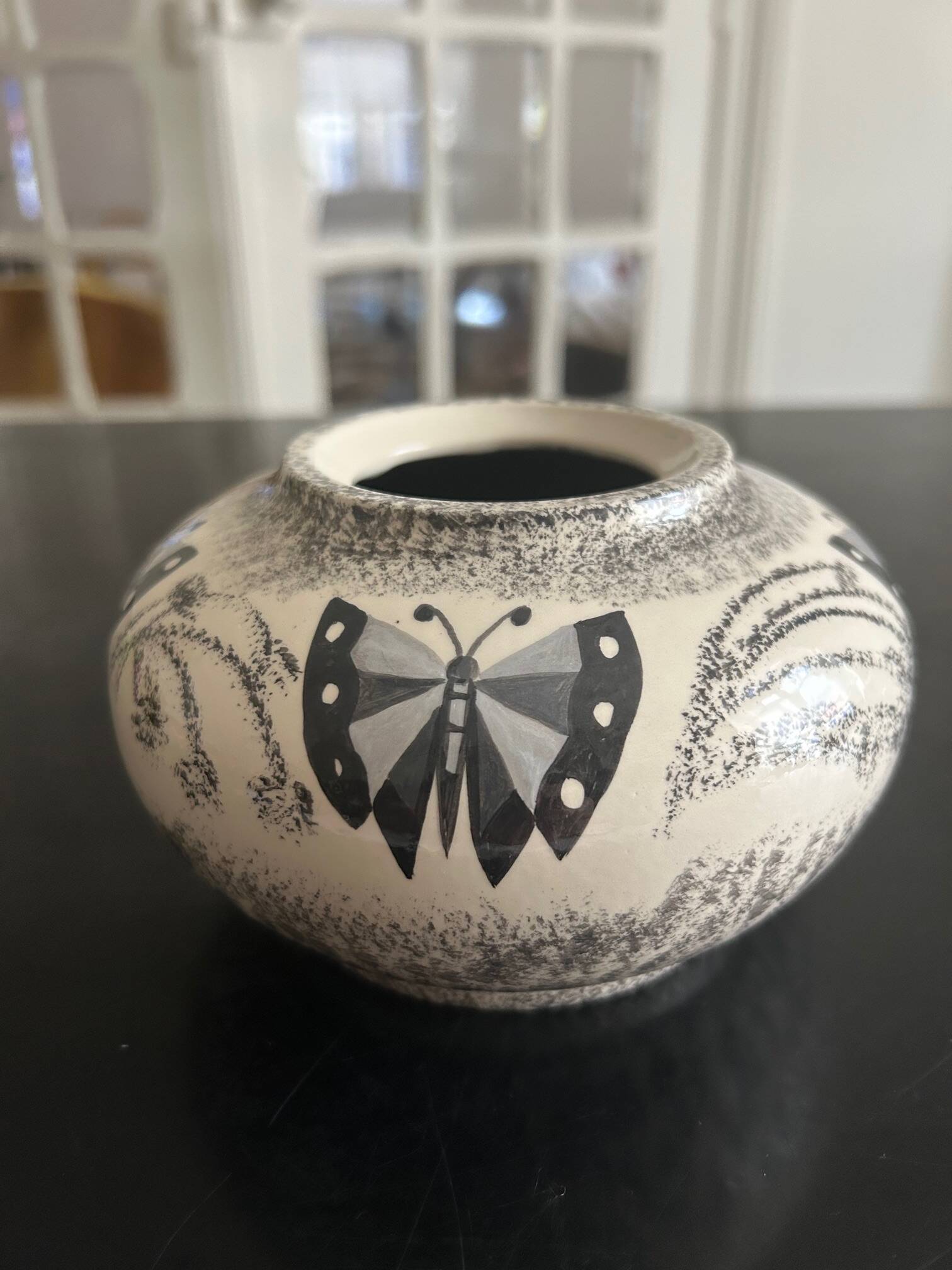 ceramic vase decorated by the artist René Poirot