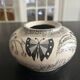 ceramic vase decorated by the artist René Poirot