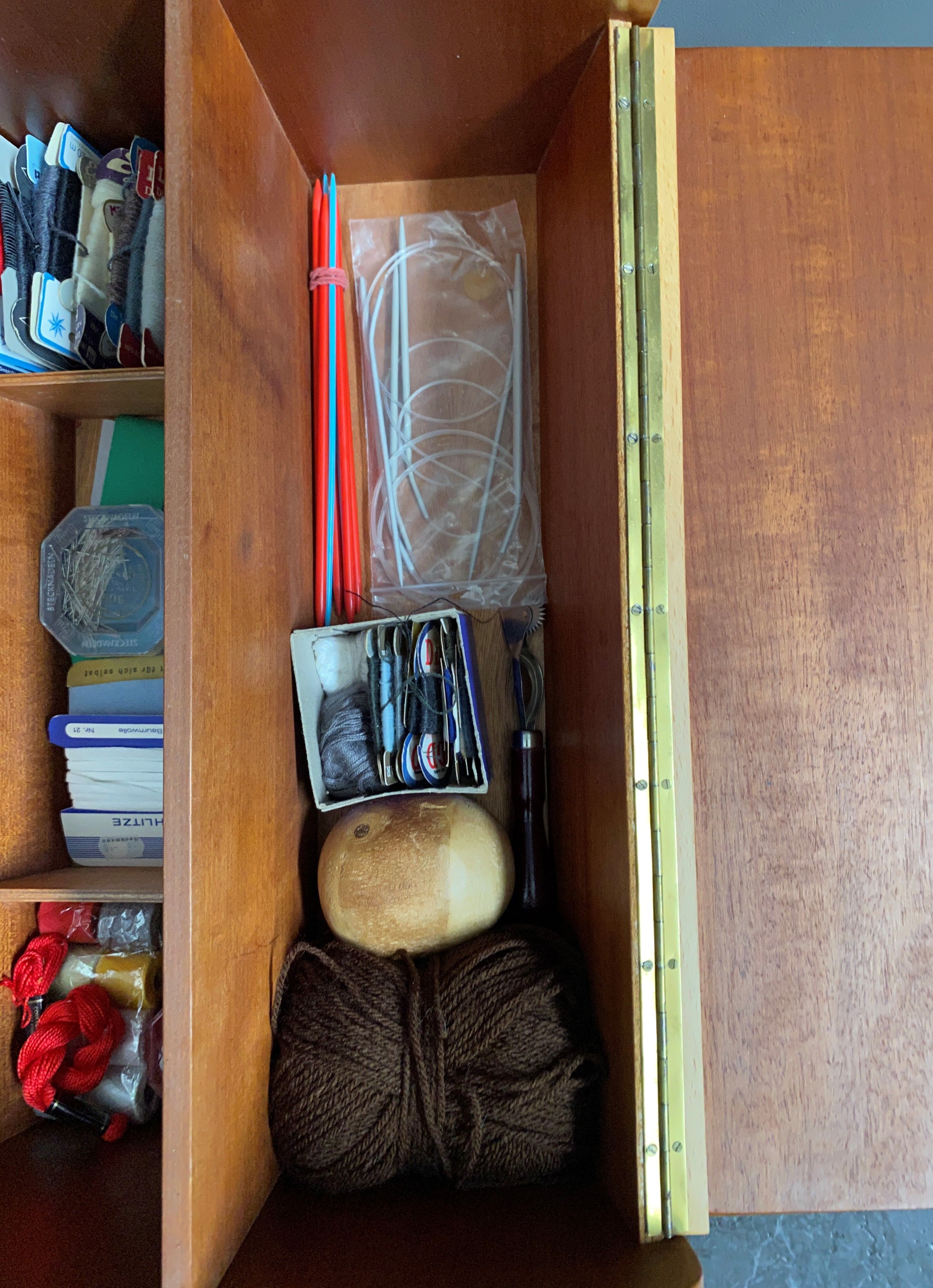 Sewing box on legs and wheels