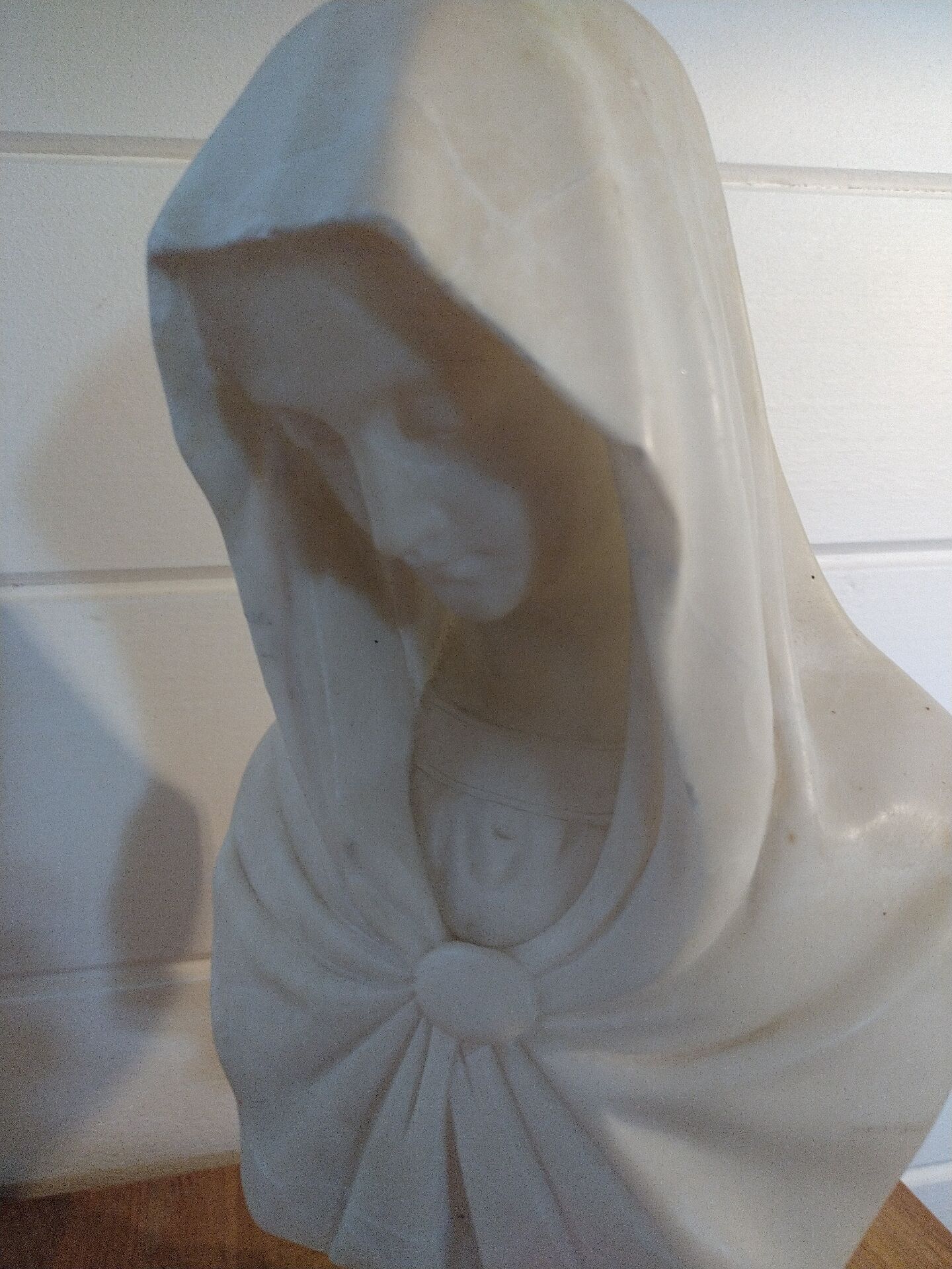 Bust of the Virgin in alabaster by Guglielmo Pugi.