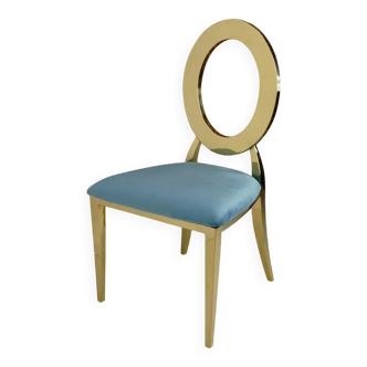 Gold chair and turquoise velvet seat