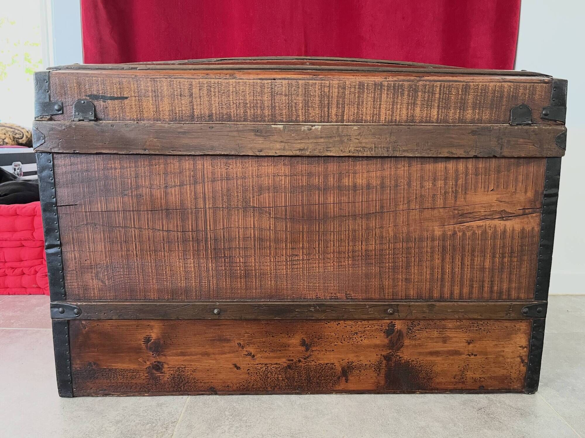 Curved wooden transport trunk from the late 19th to early 20th century.