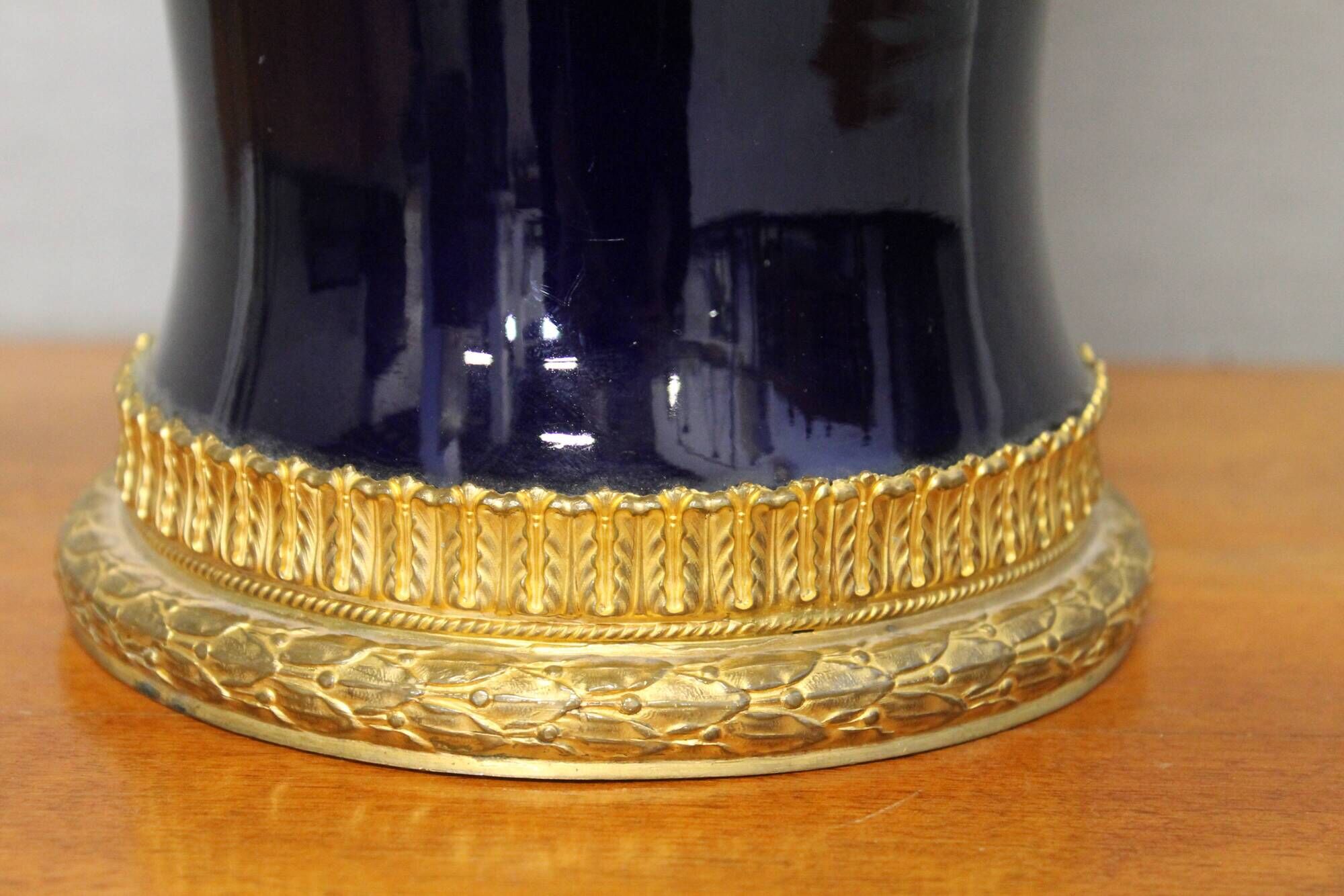Vase signed Legastelois in blue ceramic of Sèvres and gilded bronze