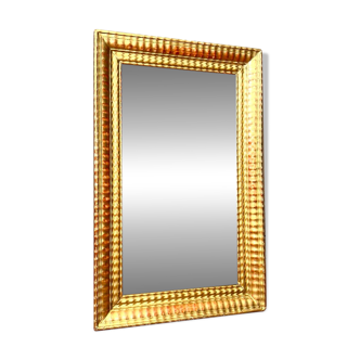 Antique gilded mirror from the Directoire period, 19th century.