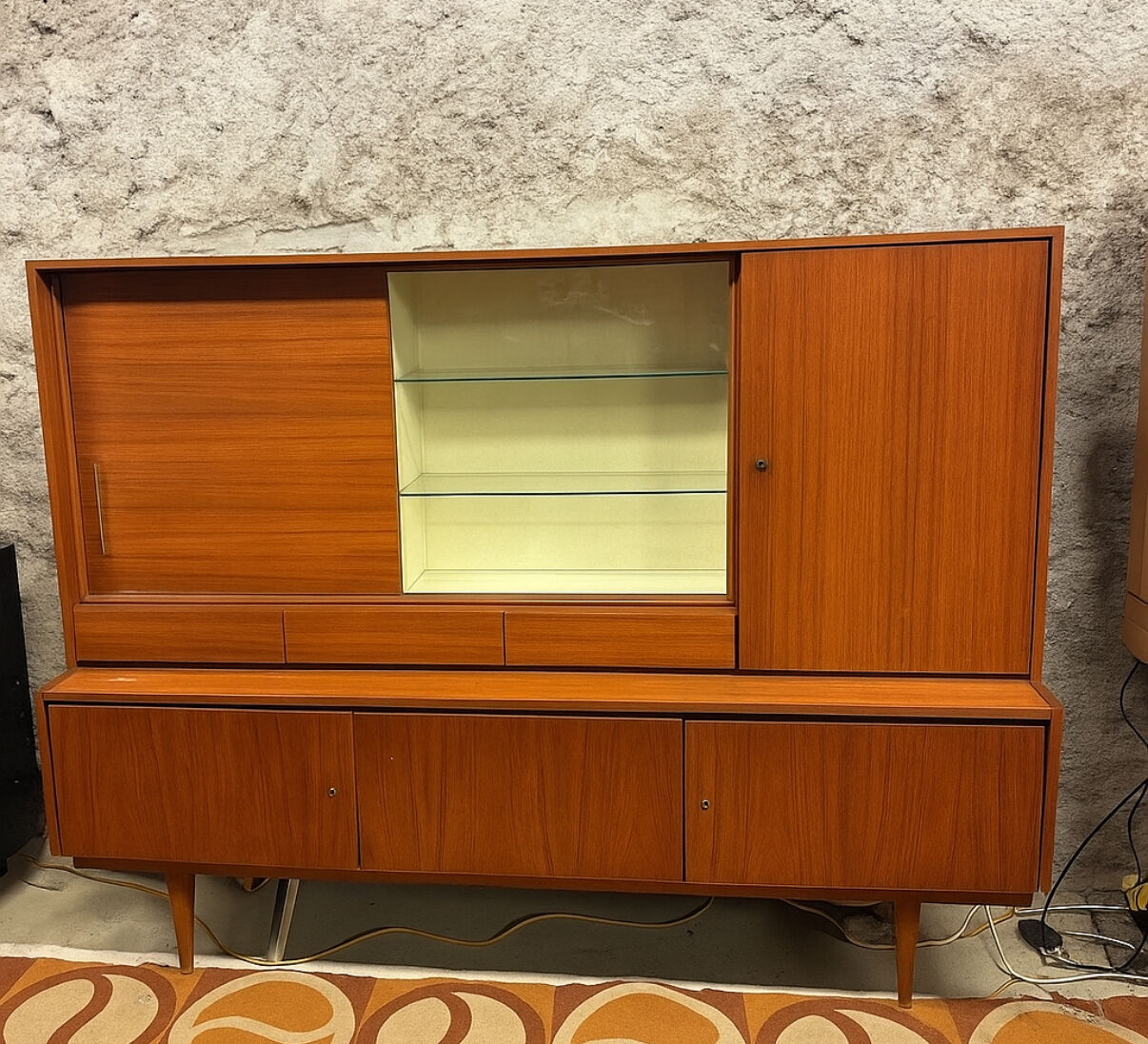 Vintage Scandinavian teak sideboard with compass feet from the 70s