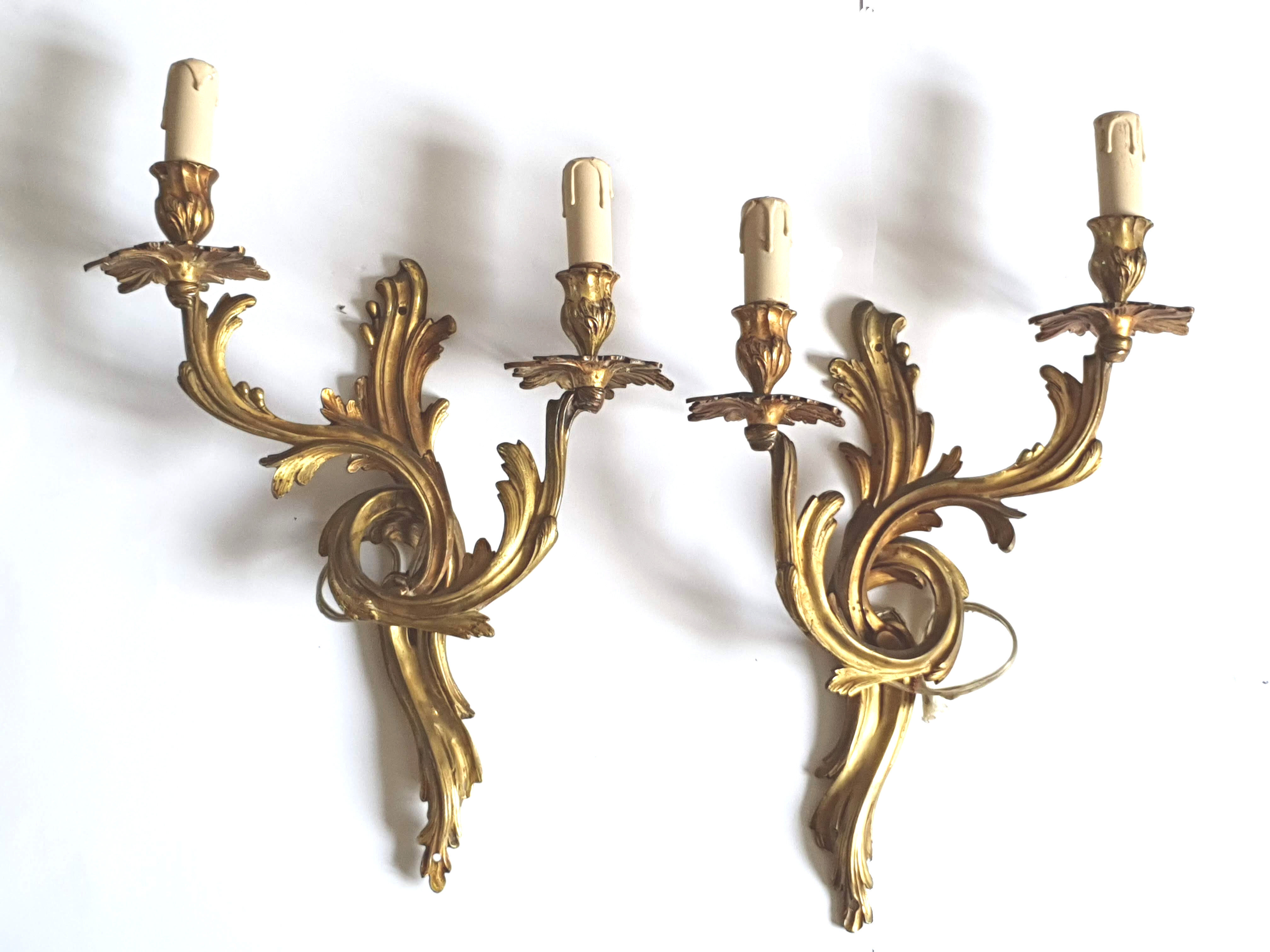 Duo of gilded bronze wall lamps