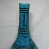Vase en céramique islamique à fond turquoise