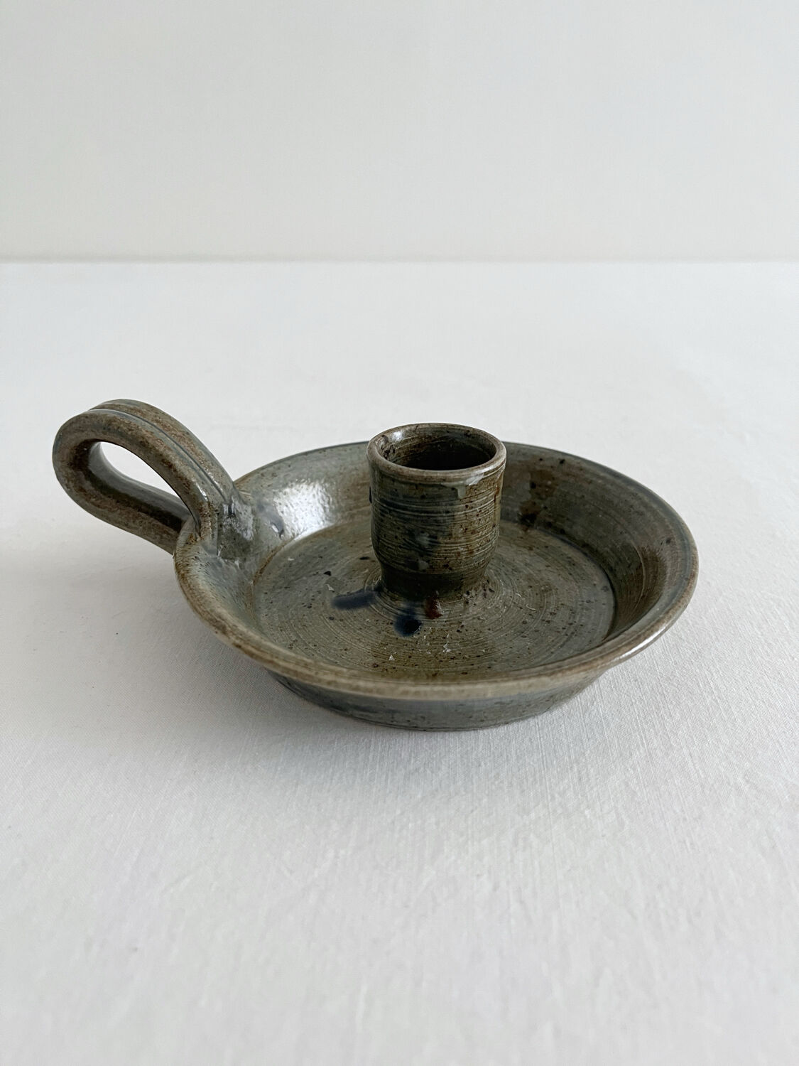 Vintage glazed stoneware hand candlestick