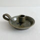Vintage glazed stoneware hand candlestick