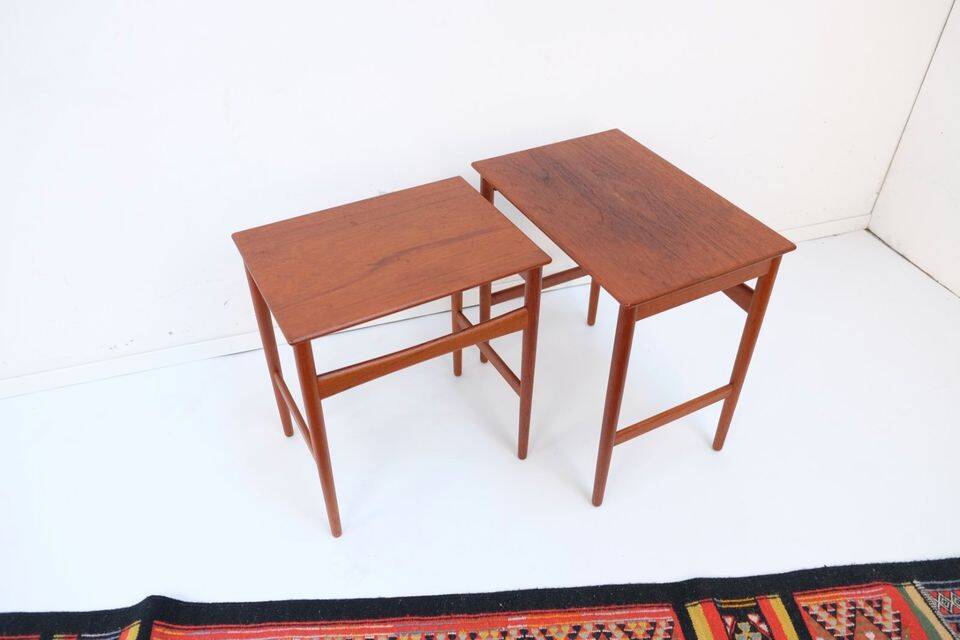 Mid-century side tables and nesting tables, in Wegner Tuck teak, Danish style.