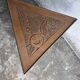 Triangular side table in carved wood, Art Nouveau, France, circa 1915.