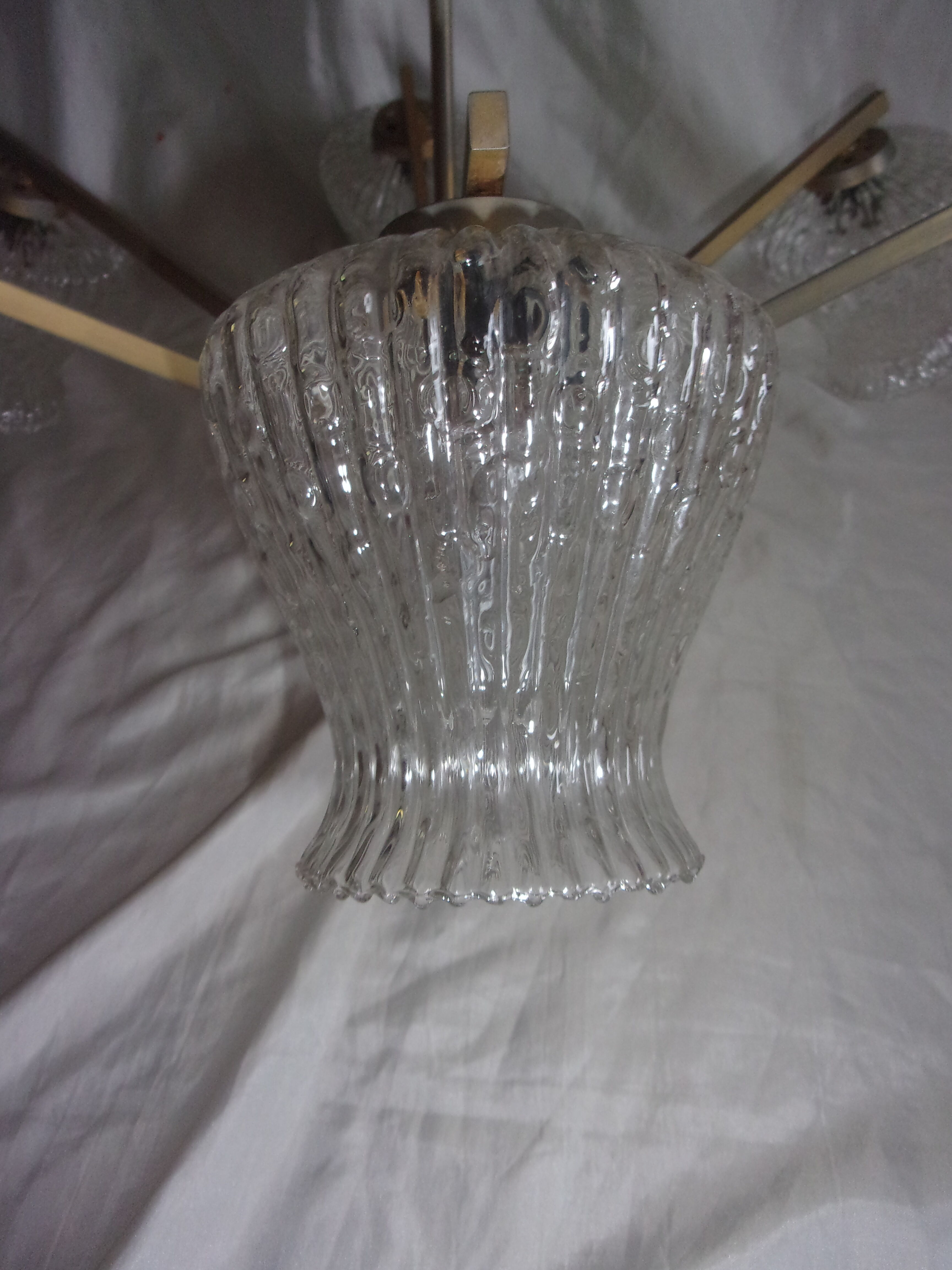 Chandelier in golden metal and vintage red pvc