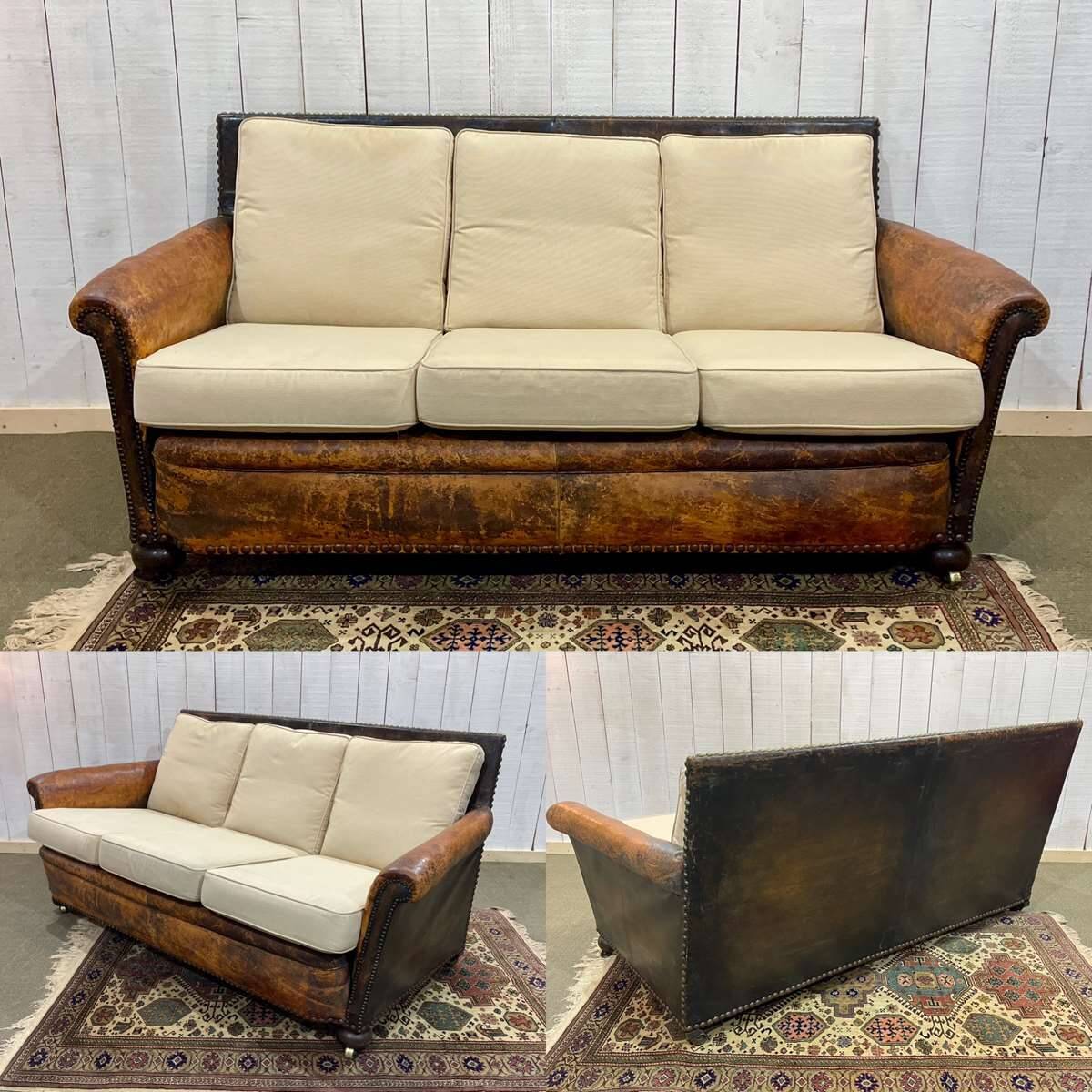 Early 20th century leather club sofa - seat and back in modern fabric