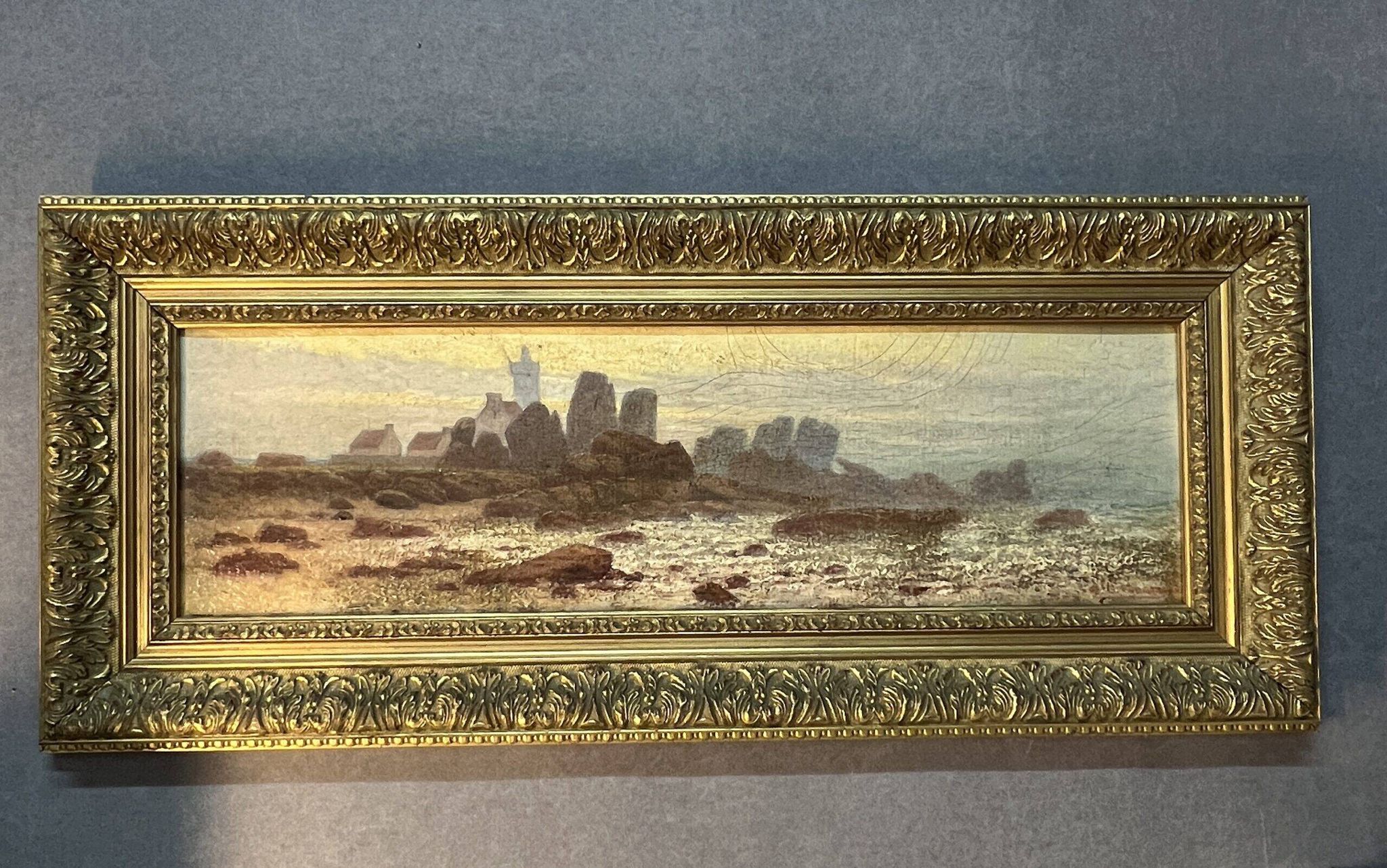 A. Laemmermann, oil painting on cardboard depicting a rocky landscape.