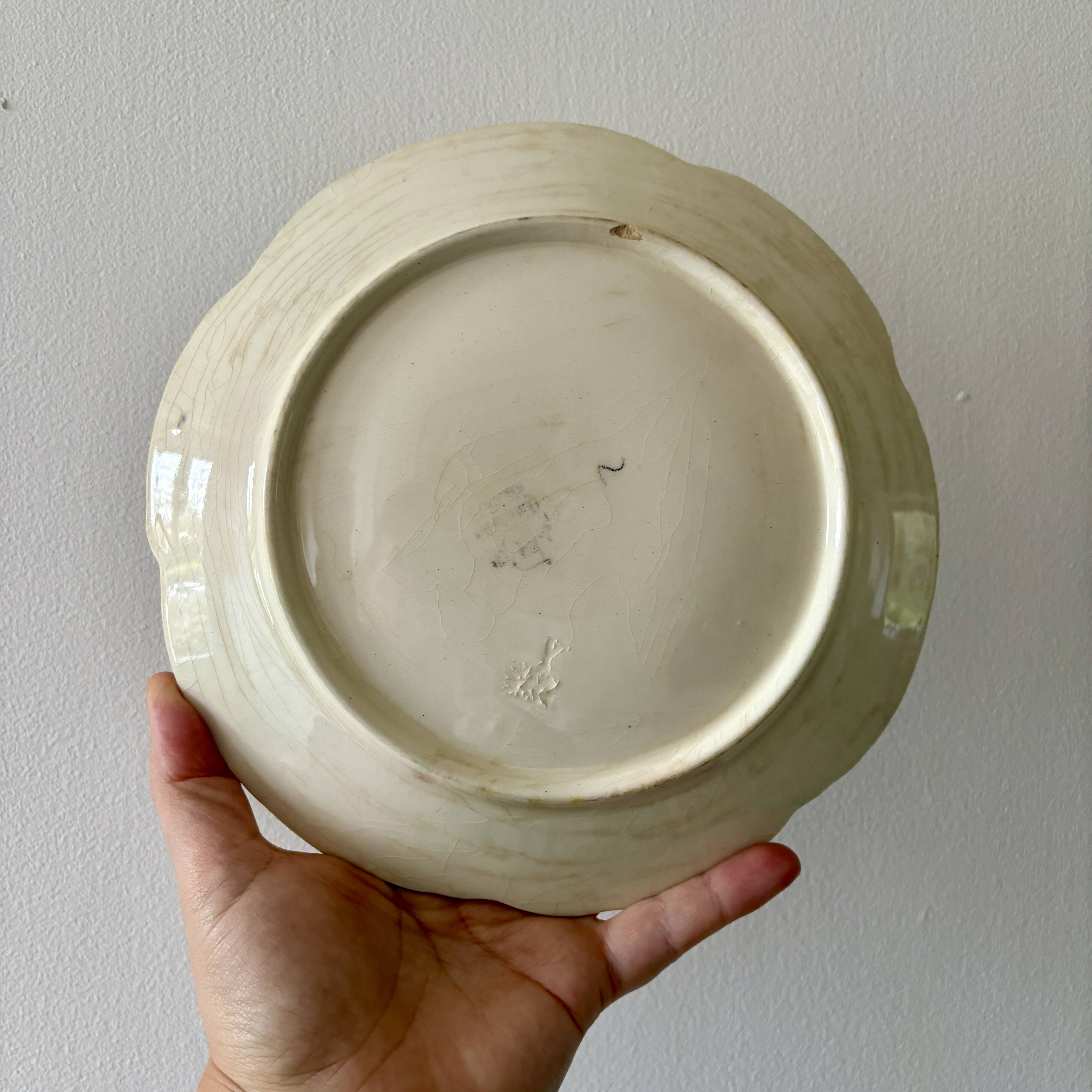Set of 10 antique slip plates with flower decorations