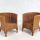 Pair of cabriolet armchairs in wicker and black edging