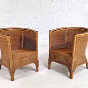 Pair of cabriolet armchairs in wicker and black edging
