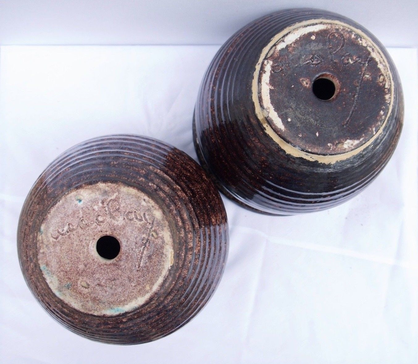 Pair of Accolay vintage ceramic pot cover