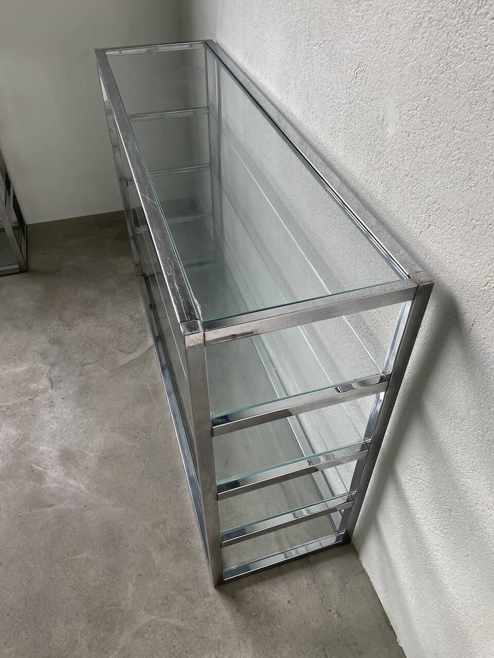 Pair of chrome and glass shelves from the 70s