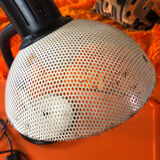 Flexible perforated metal desk lamp