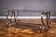 Riveted metal industrial coffee table, Jansen style