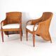 Pair of wooden and wicker armchairs