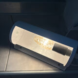 Metal wall light with shutter