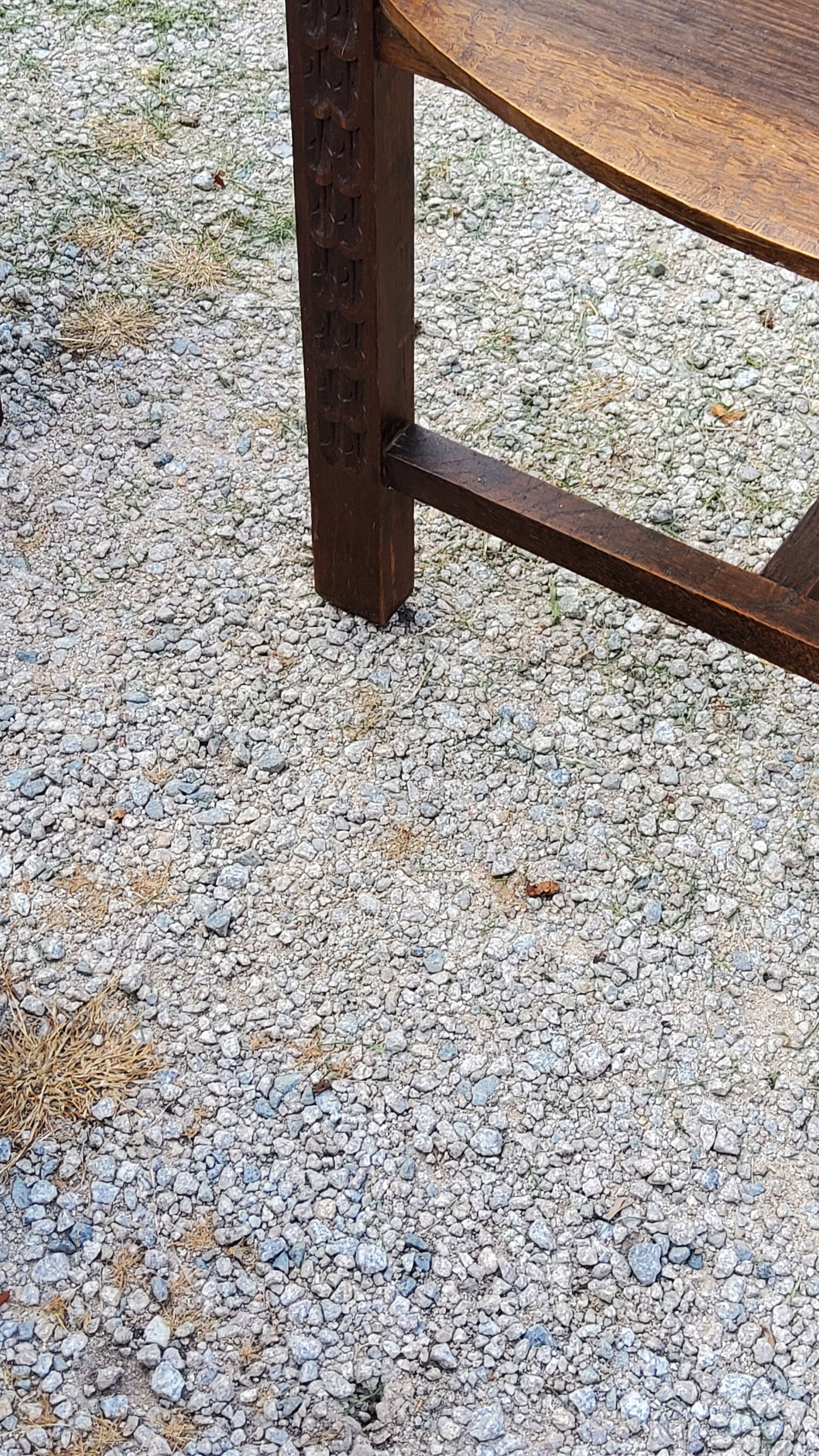 Set of three brutalist tripod armchairs in carved solid oak