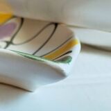 Three vintage free-form ceramic ravine dishes from the 1950s