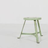 Industrial green painted stool with steel base and wooden top, France 1930s