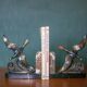 Pair of art deco seagull bookends in regulates and marble, bookcase, desk
