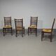 Ensemble de 4 chaises de salle à manger en chêne, rustiques, de ferme, à dossier en échelle avec sièges en jonc, années 1960