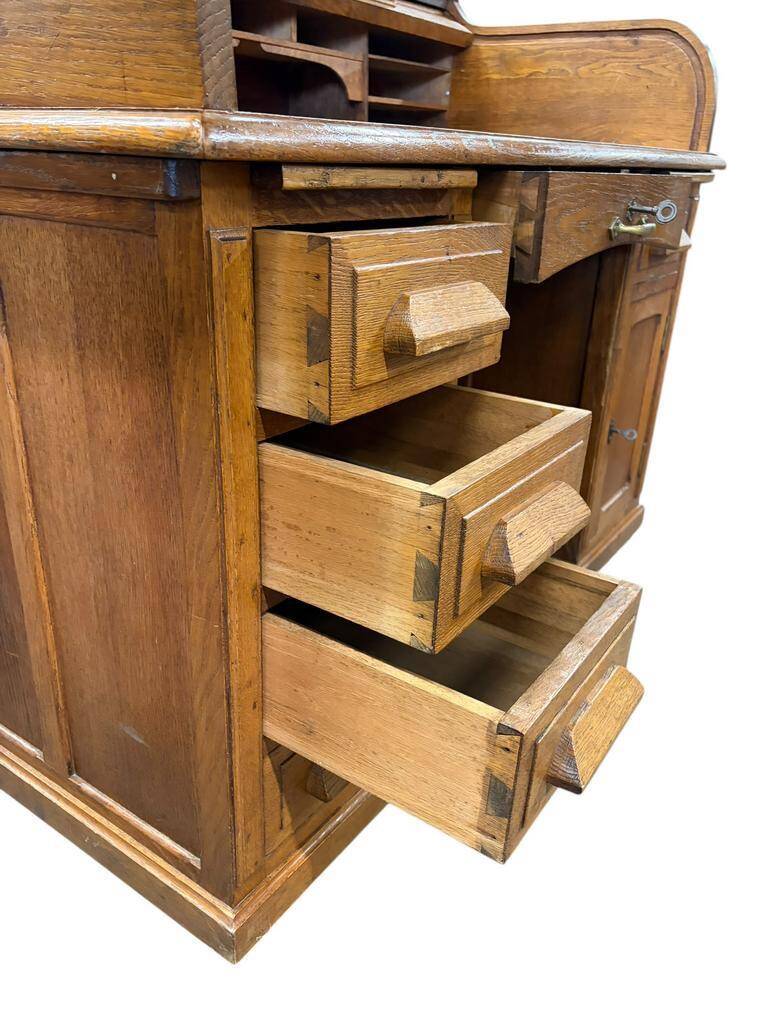 Vintage American desk made of solid wood with a curtain.