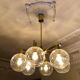 Lustre "Pastoral" en laiton avec six globes Hans-Agne Jakobsson