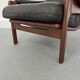 Fauteuil en teck et cuir années 1960