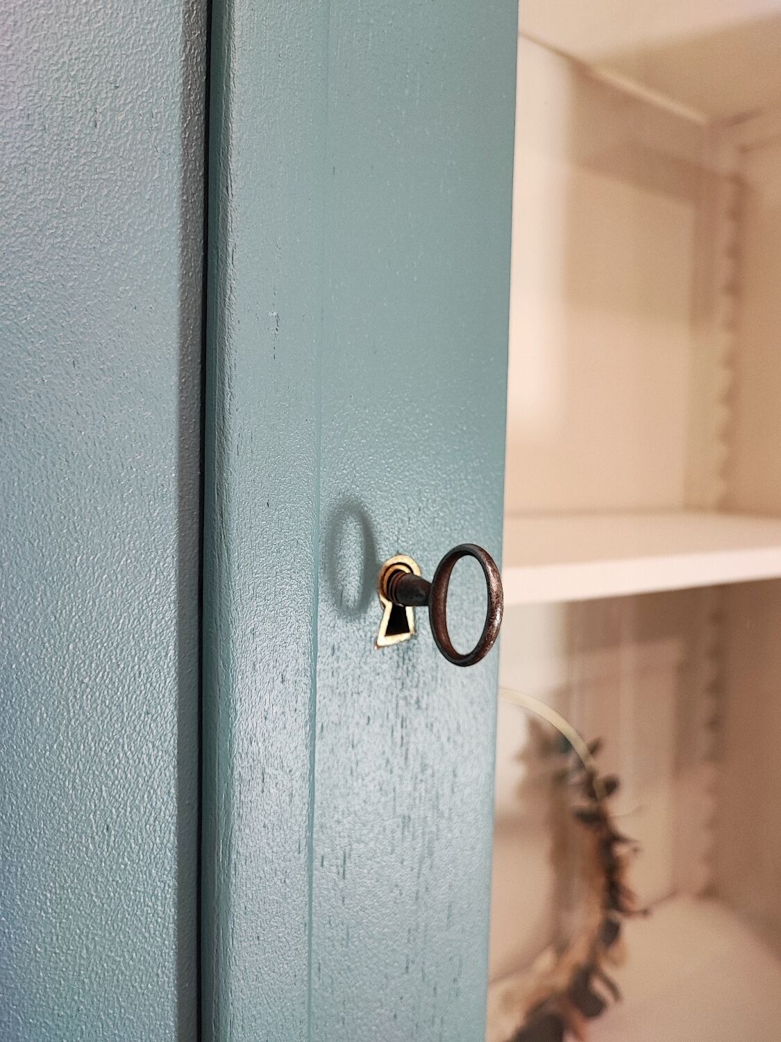 Blue vintage bookcase
