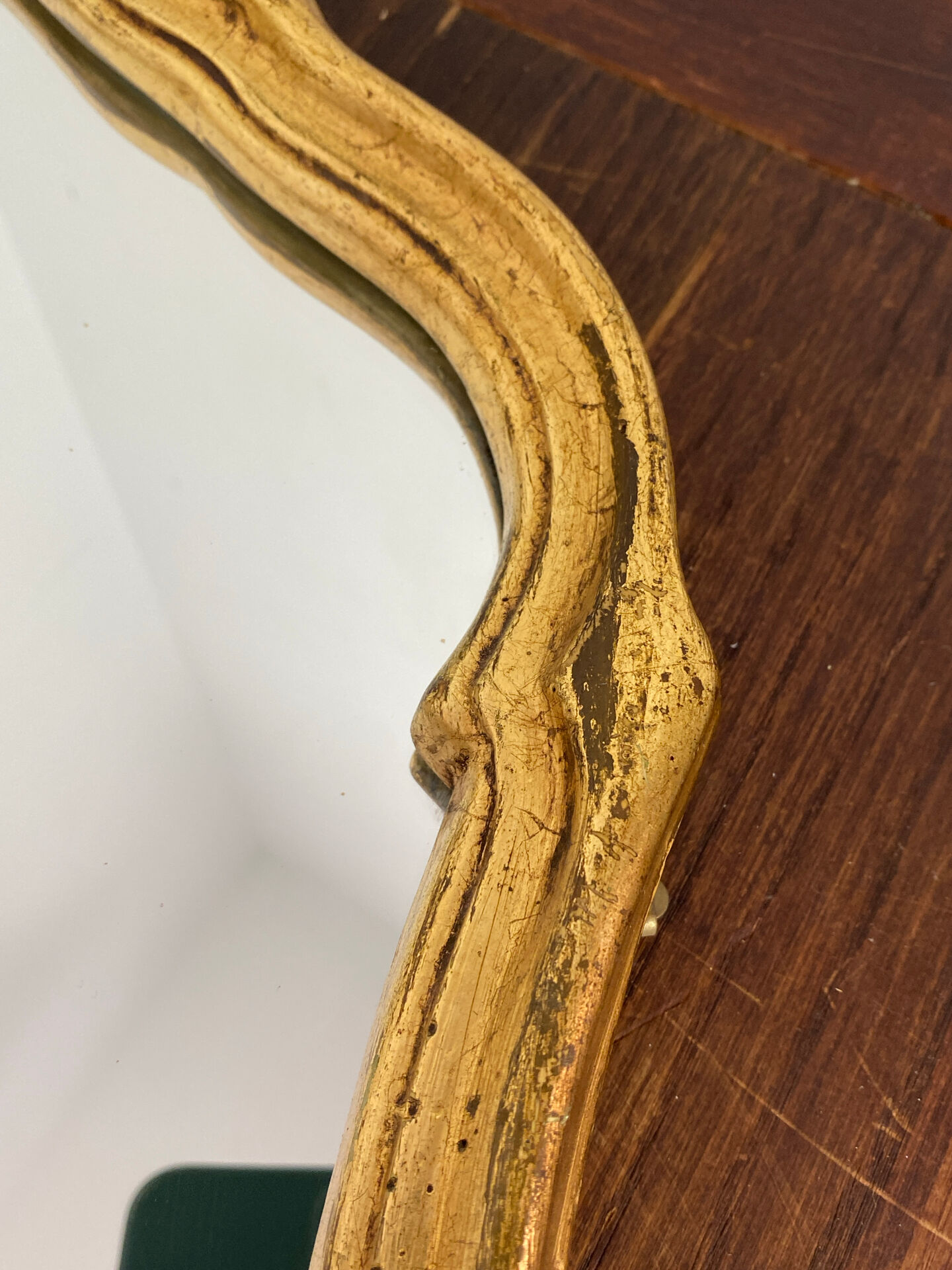 Large baroque mirror in gilded wood