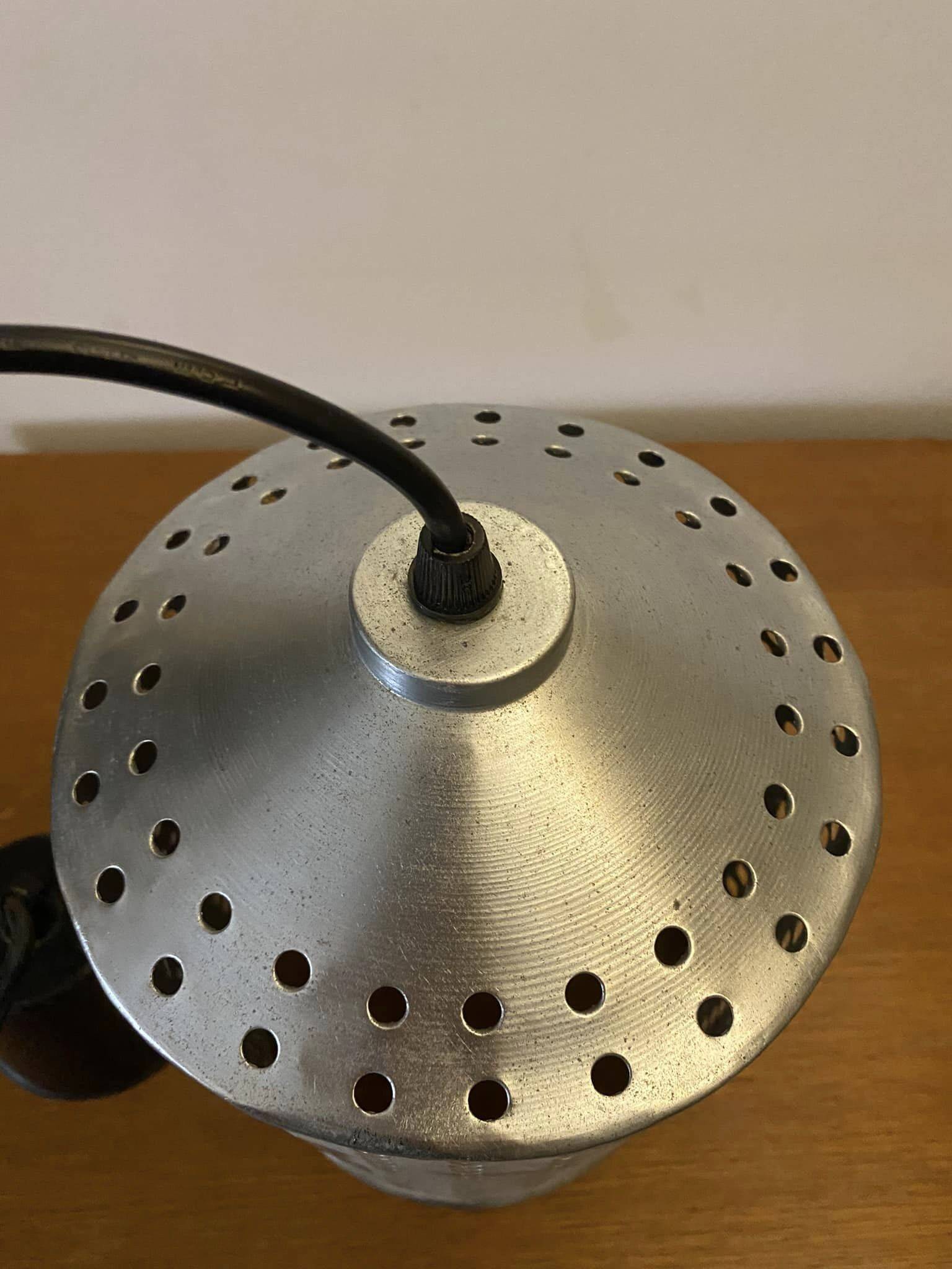 Industrial pendant lamp in perforated gray metal