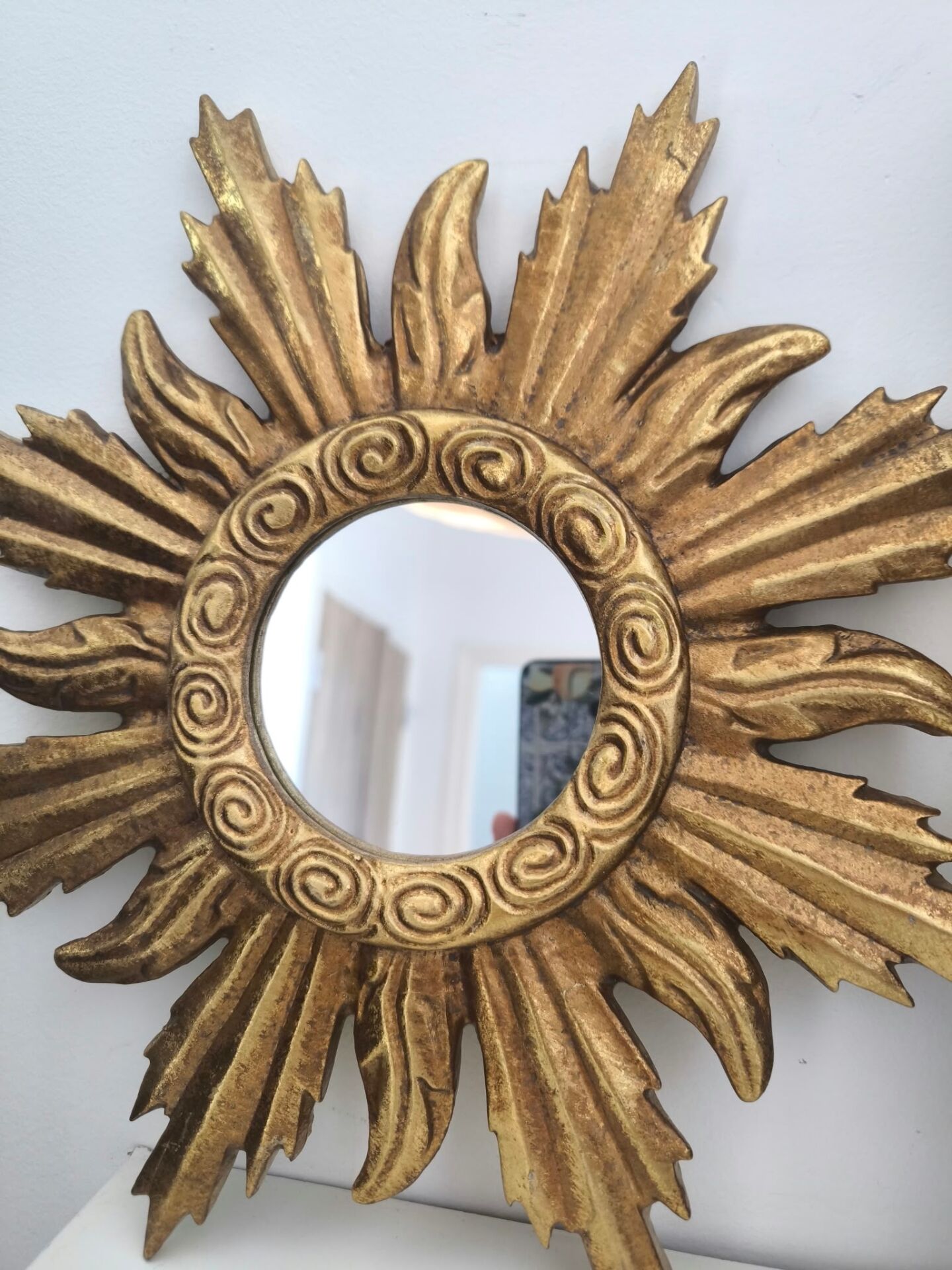 Miroir soleil doré