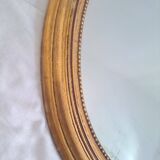 Miroir ancien en bois doré