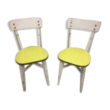 2 sun yellow formica chairs