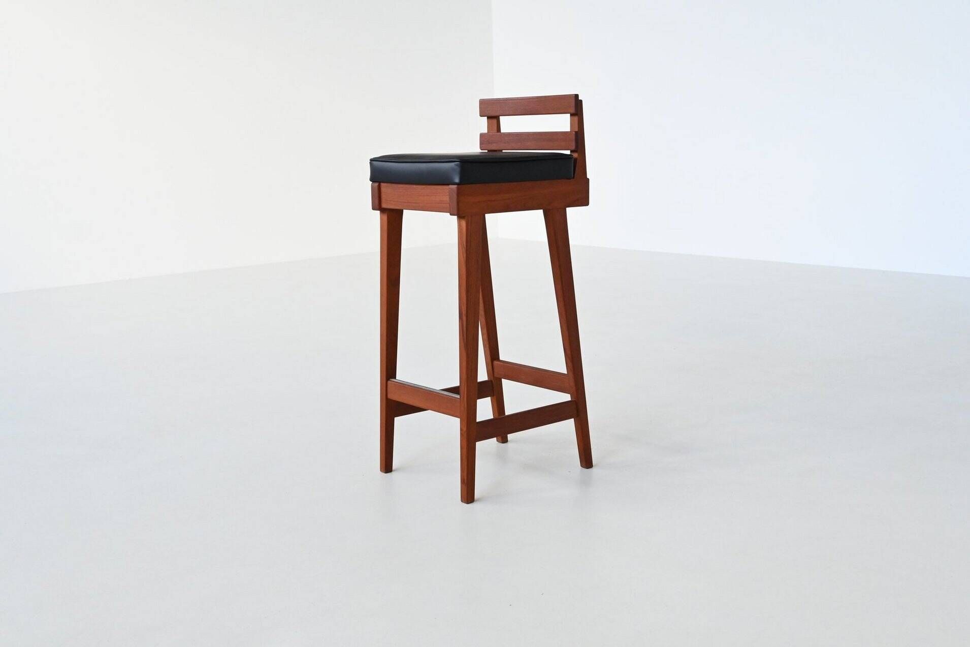 Erik Buck set of three bar stools in teak and leather Dyrlund Denmark 1960