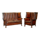 Victorian leather canapé and armchair, barrel back, circa 1860, restored.