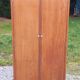 Vintage oak wardrobe with metal legs from the 1950s.