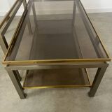 Coffee table in brass and smoked glass designed by Guy Lefèvre for the Jansen house, 1970s/80s