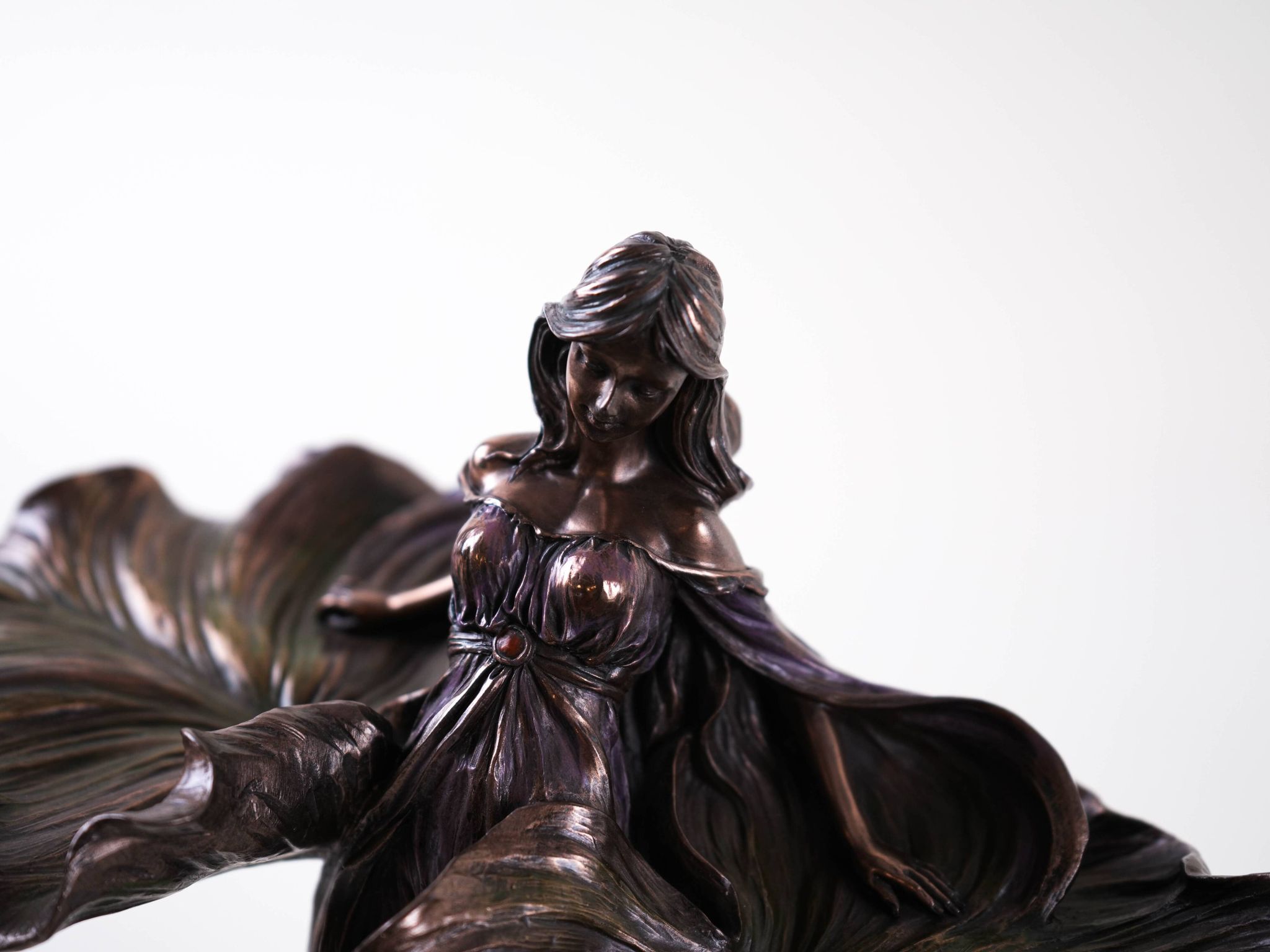 Brass female figurine in Art Deco style with floral motifs, European decorative art